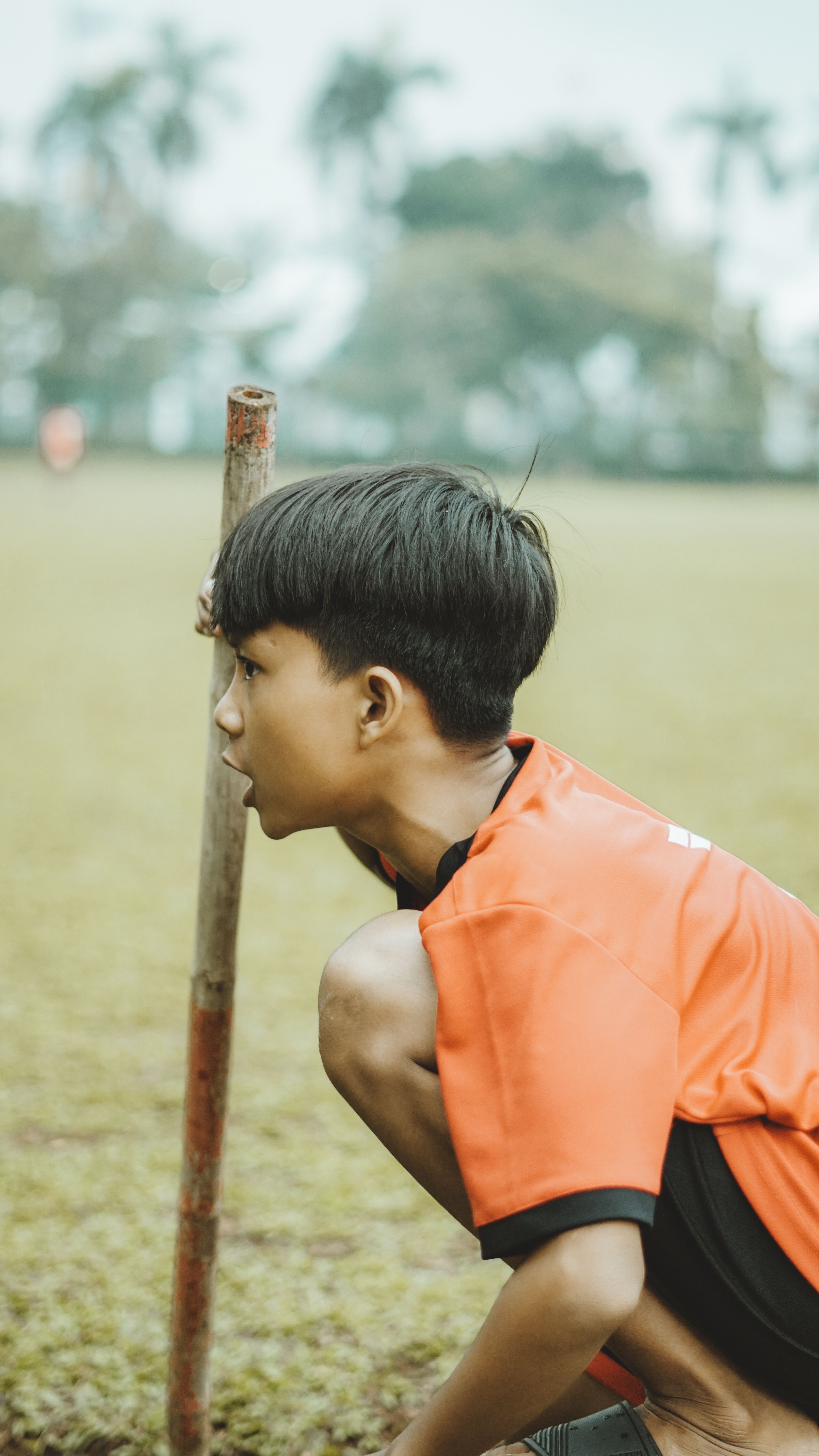 Active Indonesian Child Playing Outdoors in Park