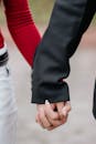 Close-up of Hands Holding in Affectionate Moment