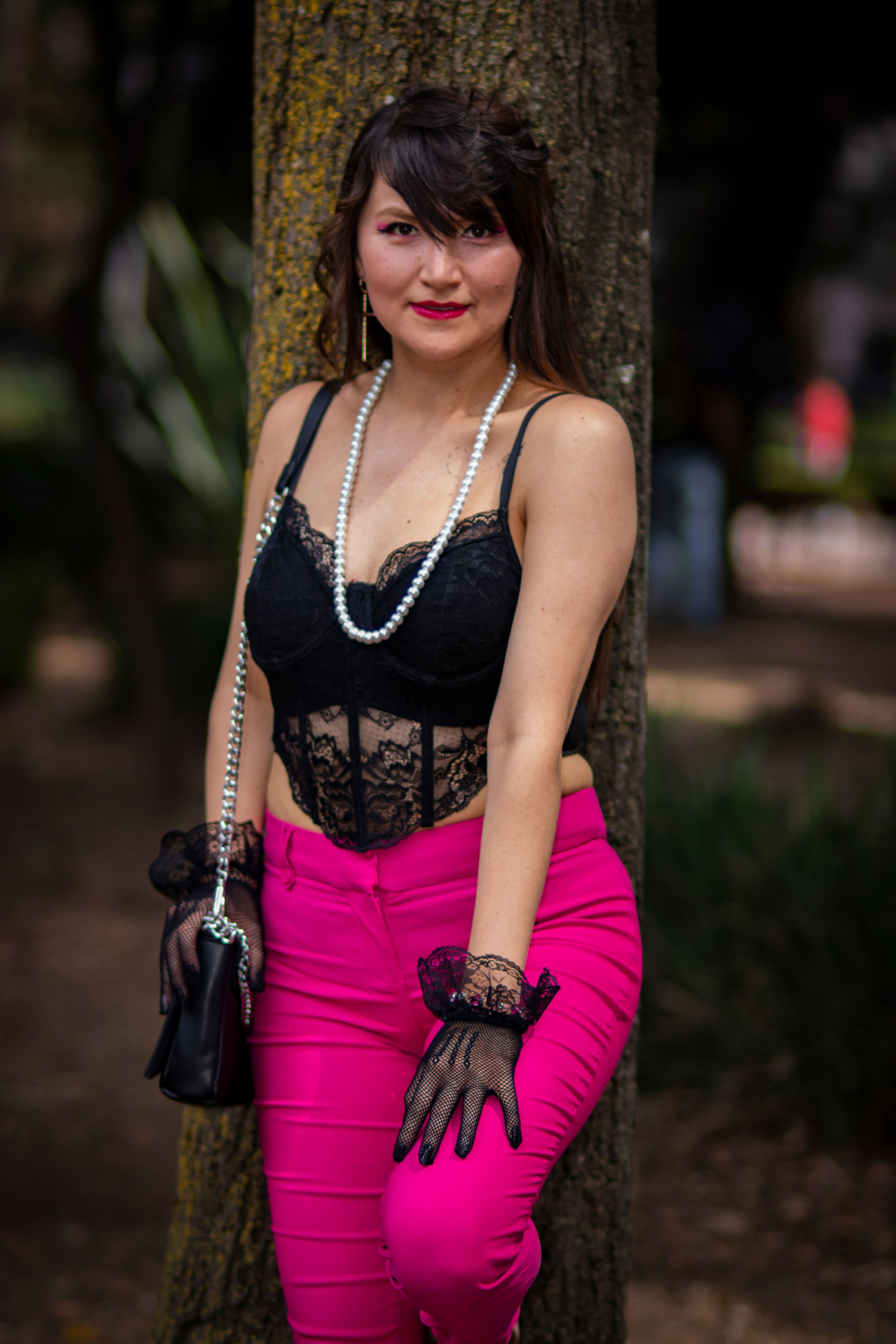 Stylish Woman Posing Outdoors in Vibrant Outfit · Free Stock Photo