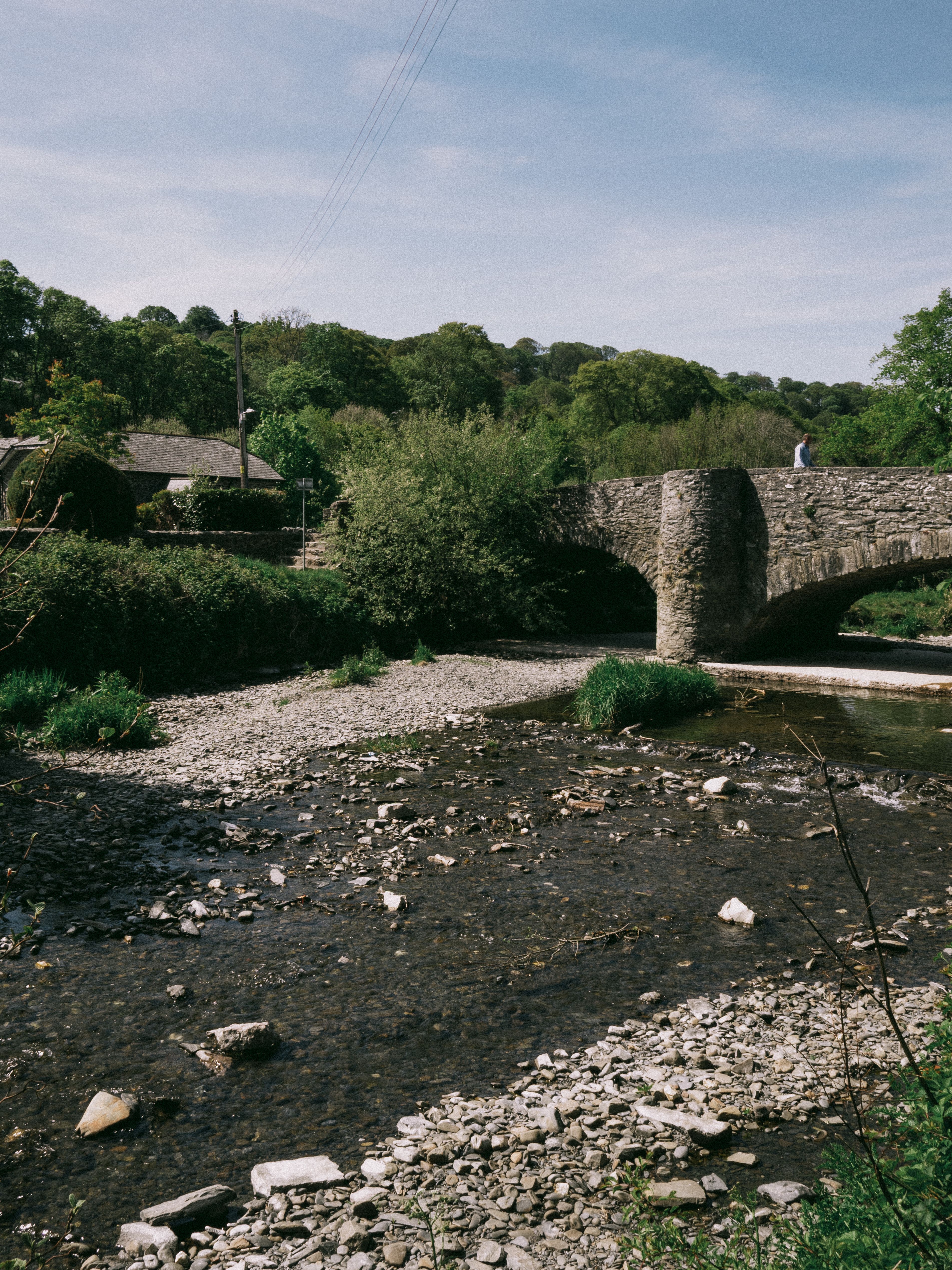 Tractor Crossing Stone Bridge in Llanfair Talhaiarn · Free Stock Photo