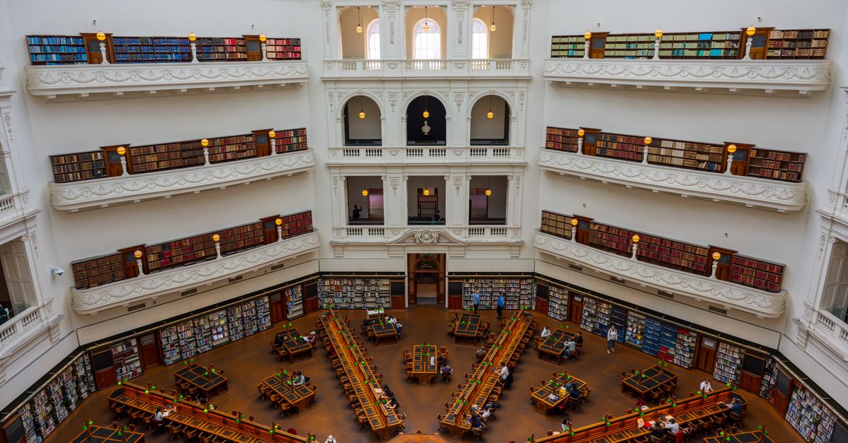 Grand Library Interior with Reading Desks · Free Stock Photo