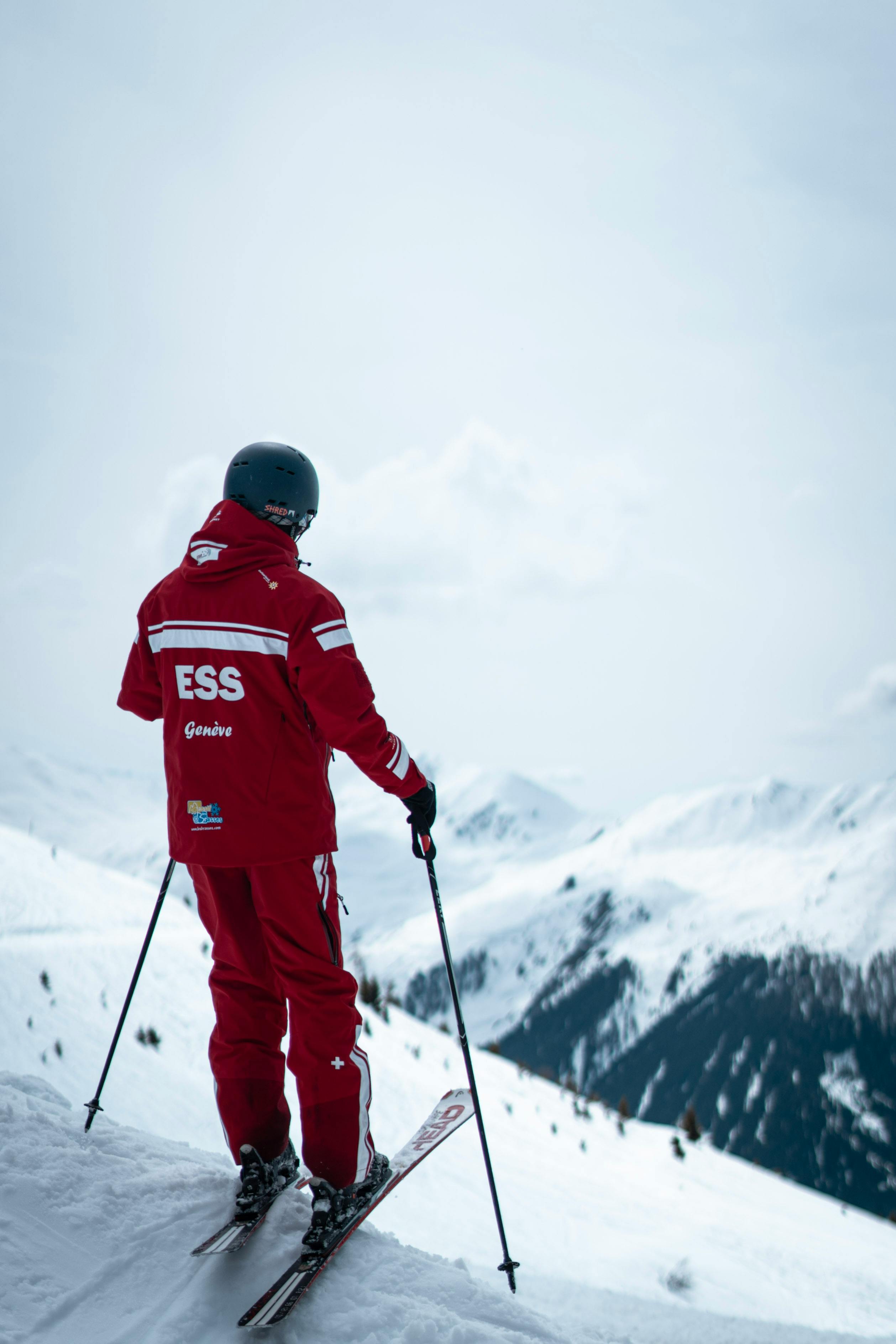 Ski instructor giving a lesson on a snowy slope
