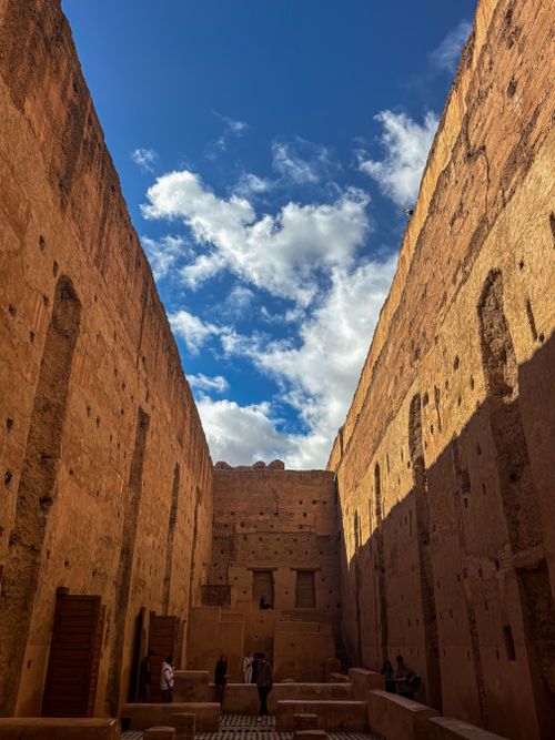 Free Capture the essence of Marrakech with this stunning view of historical Moroccan architecture under a vibrant blue sky. Stock Photo