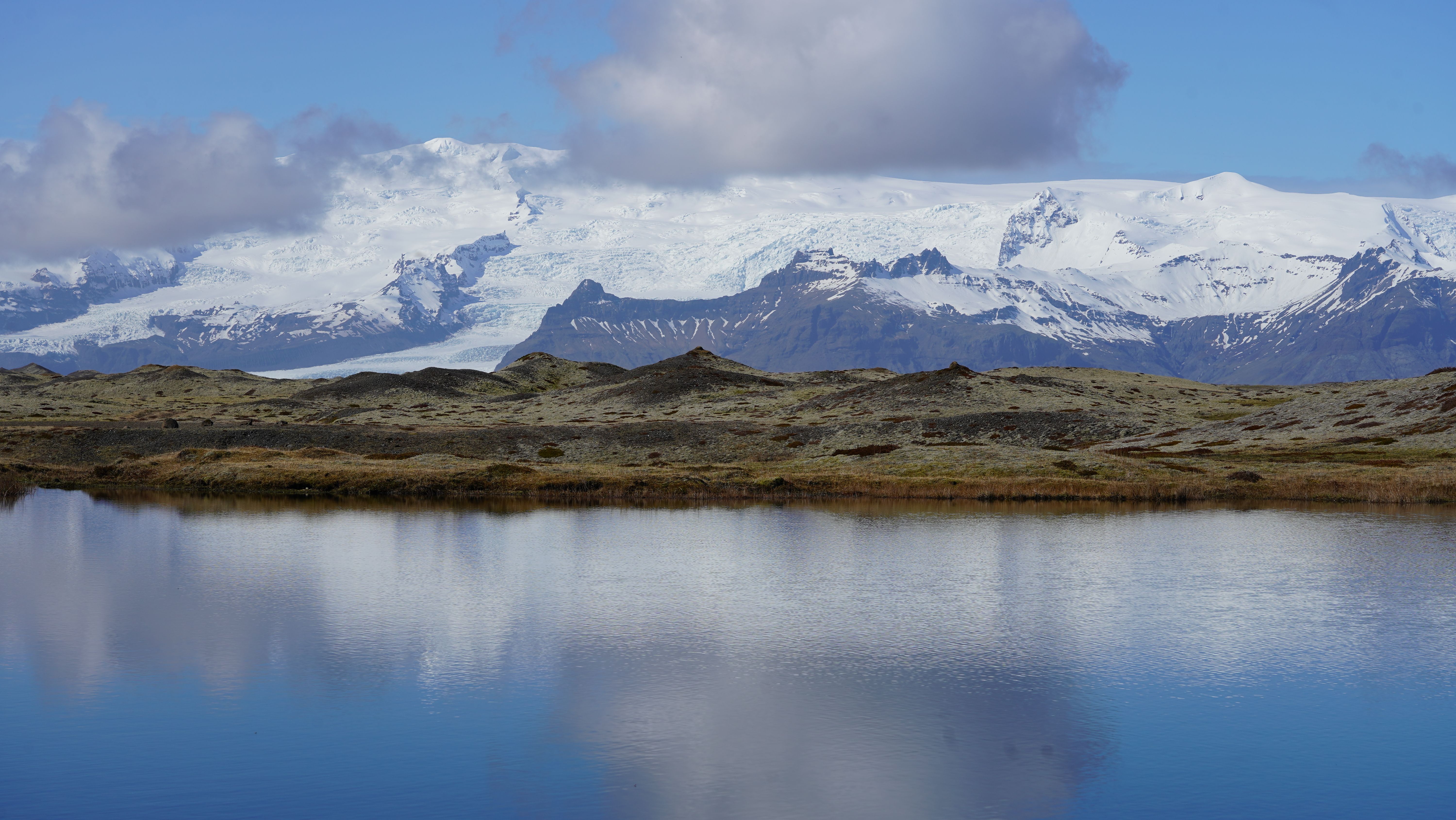 Vatnajokull glacier tongue meeting black volcanic plain