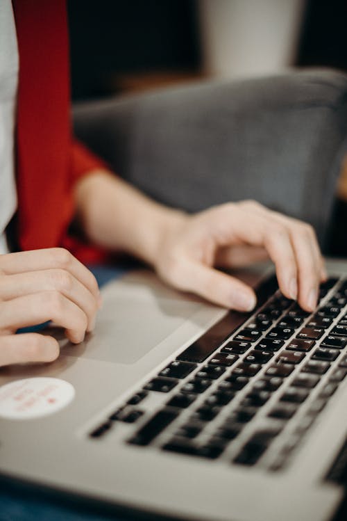 Free Person Using Gray Laptop Computer Stock Photo