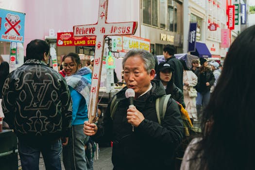 Dynamic street scene in Myeongdong, Seoul featuring lively street photography.
