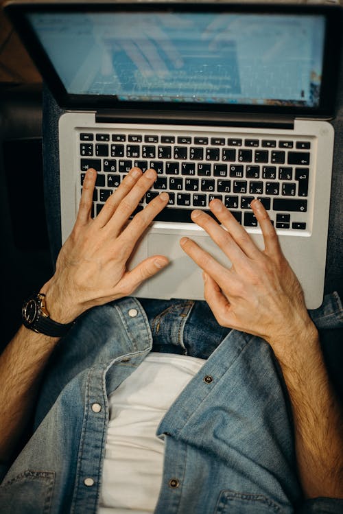 Free Person Using Laptop Computer Stock Photo