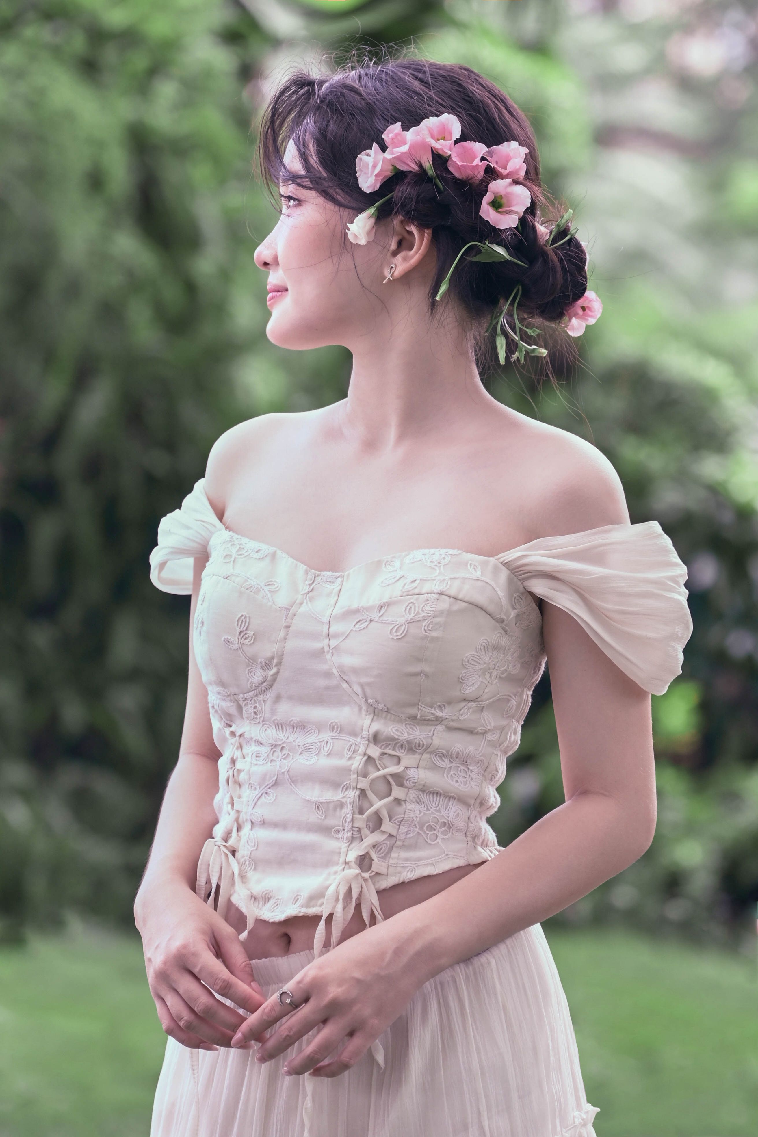 Elegant Outdoor Portrait of Woman in Floral Dress · Free Stock Photo