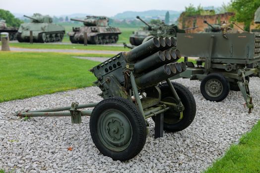 Outdoor display of vintage military vehicles and artillery in Turanj, Croatia.
