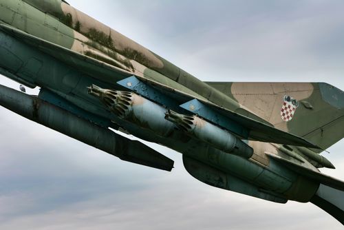 Free Close-up of a military jet fighter featuring a Croatian emblem, showcasing aviation detail. Stock Photo