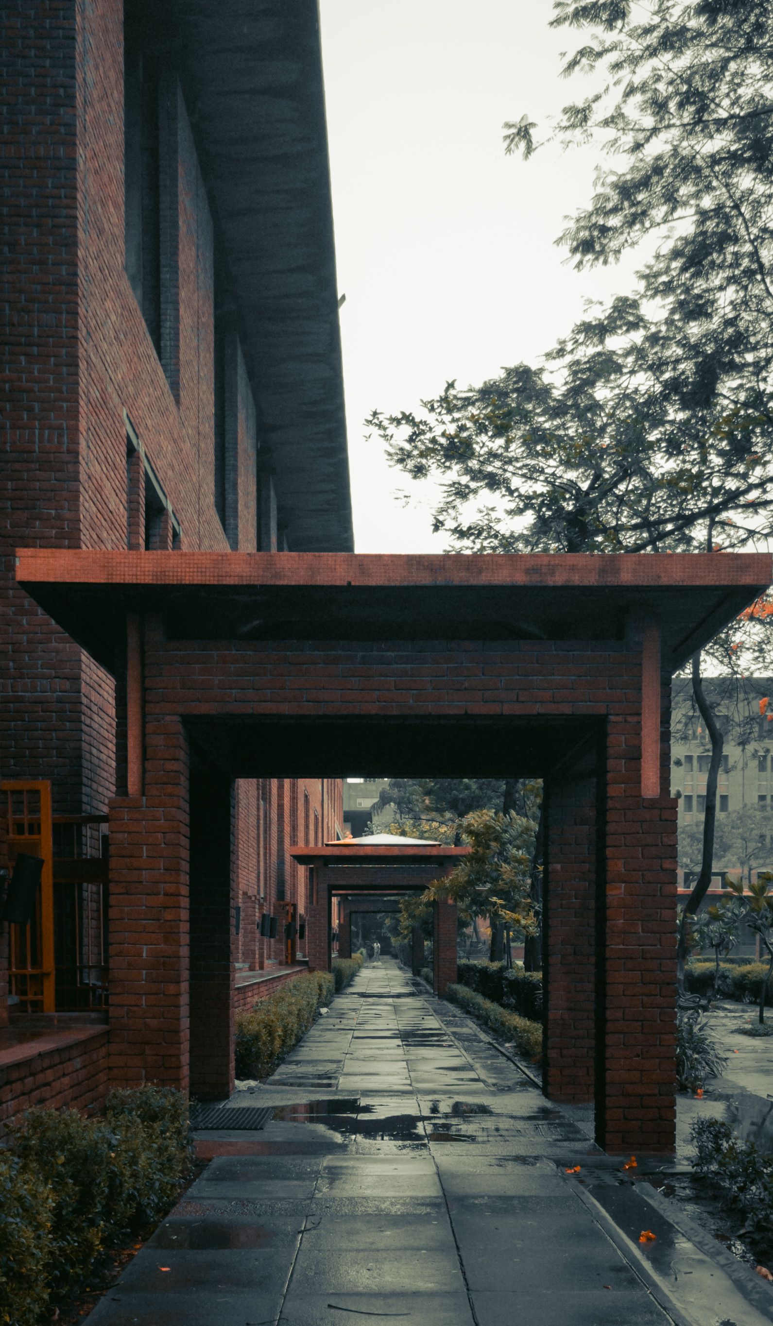 Architectural Perspective of Brick Building Walkway · Free Stock Photo