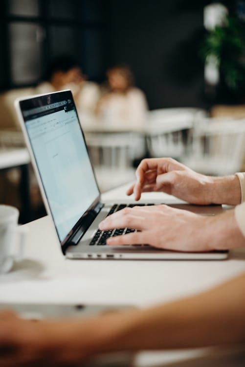 Free Person Using Laptop Computer Stock Photo