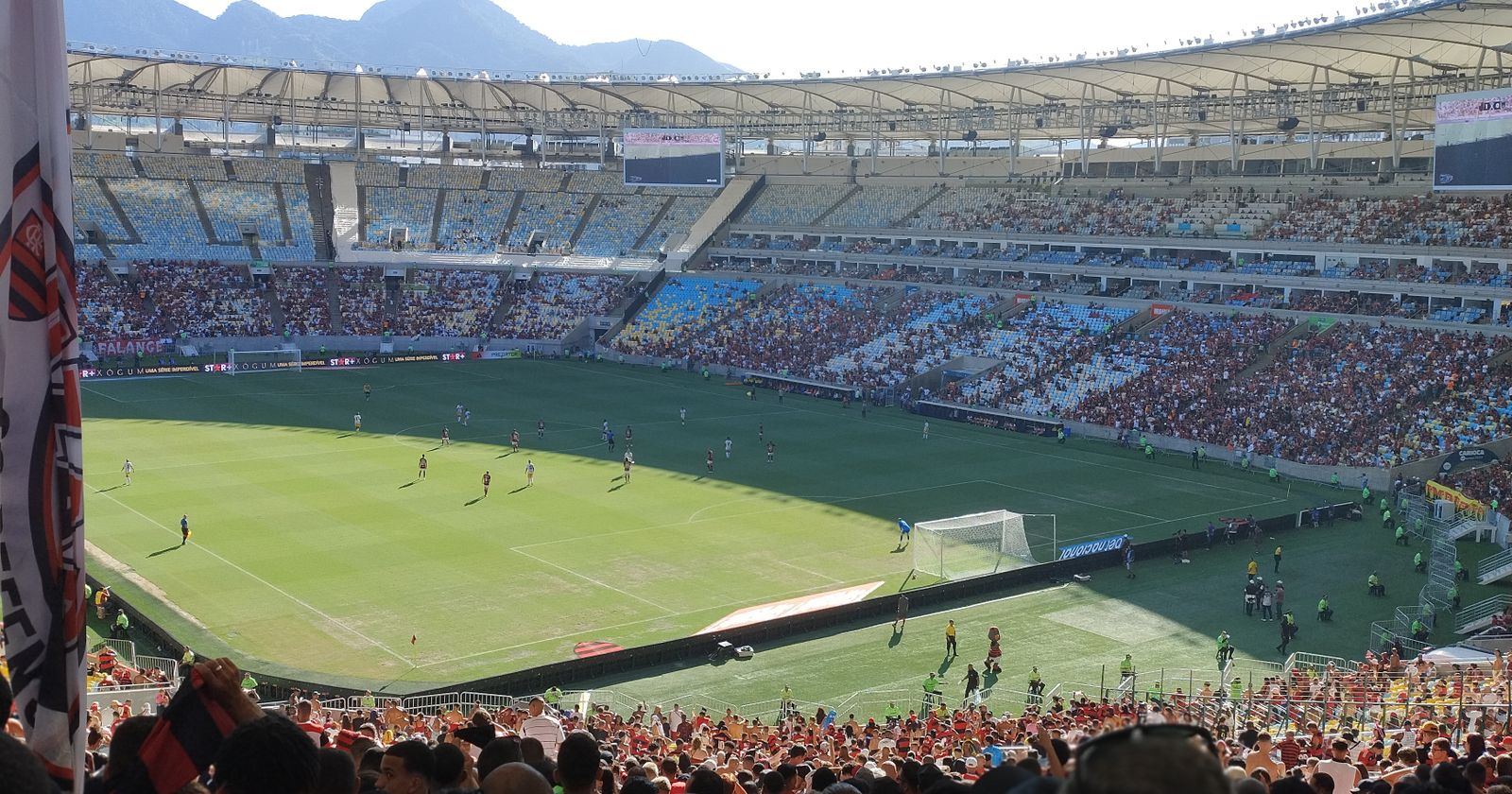 Soccer fans packed into a stadium during a World Cup match