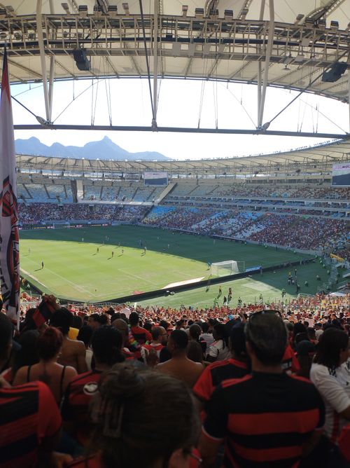 Free A vibrant soccer match at Maracanã Stadium with enthusiastic fans and scenic views. Stock Photo