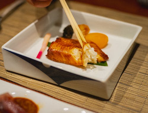 Free Elegant grilled fish dish with chopsticks in a Japanese restaurant in Kamogawa, Chiba. Stock Photo
