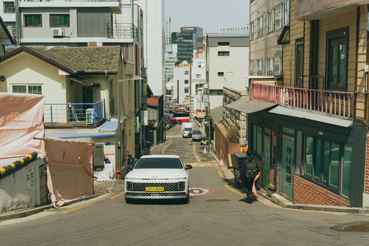 Charming traditional Seoul neighborhood street with small shops and cafes
