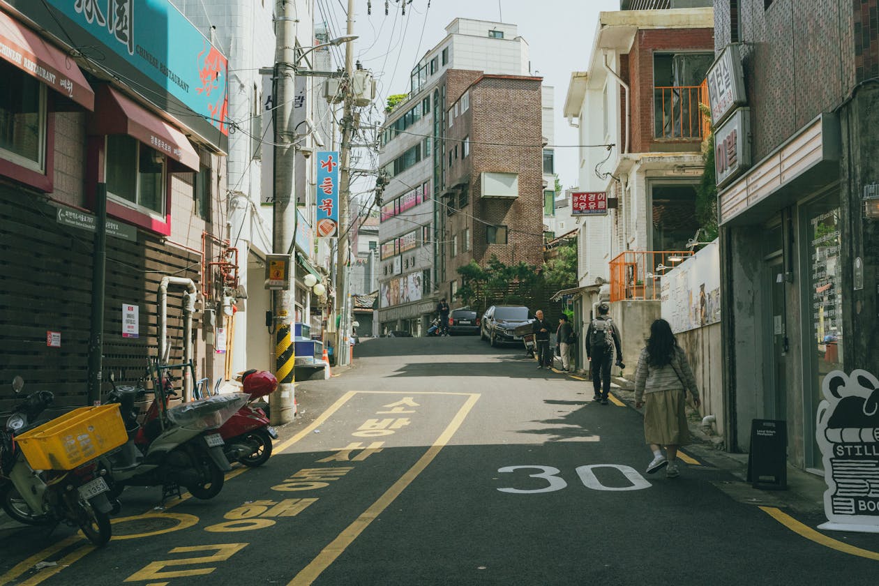 Charming streetscape of a quiet Seoul neighborhood showing everyday Korean life