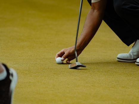 A professional golfer competing on the international professional golf circuit structure