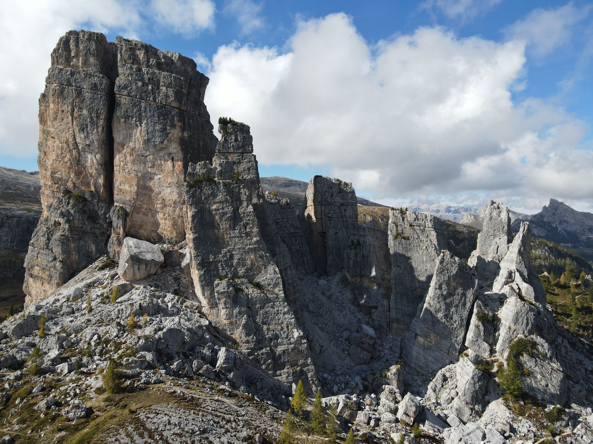 Majestic rock formations under a blue sky in the Dolomites, Italy's Trentino-Alto Adige region.