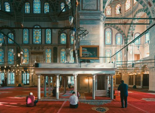 Free Interior view of an Istanbul mosque showcasing exquisite architecture and stained glass windows. Stock Photo