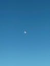 Moon in Clear Blue Sky during Daytime