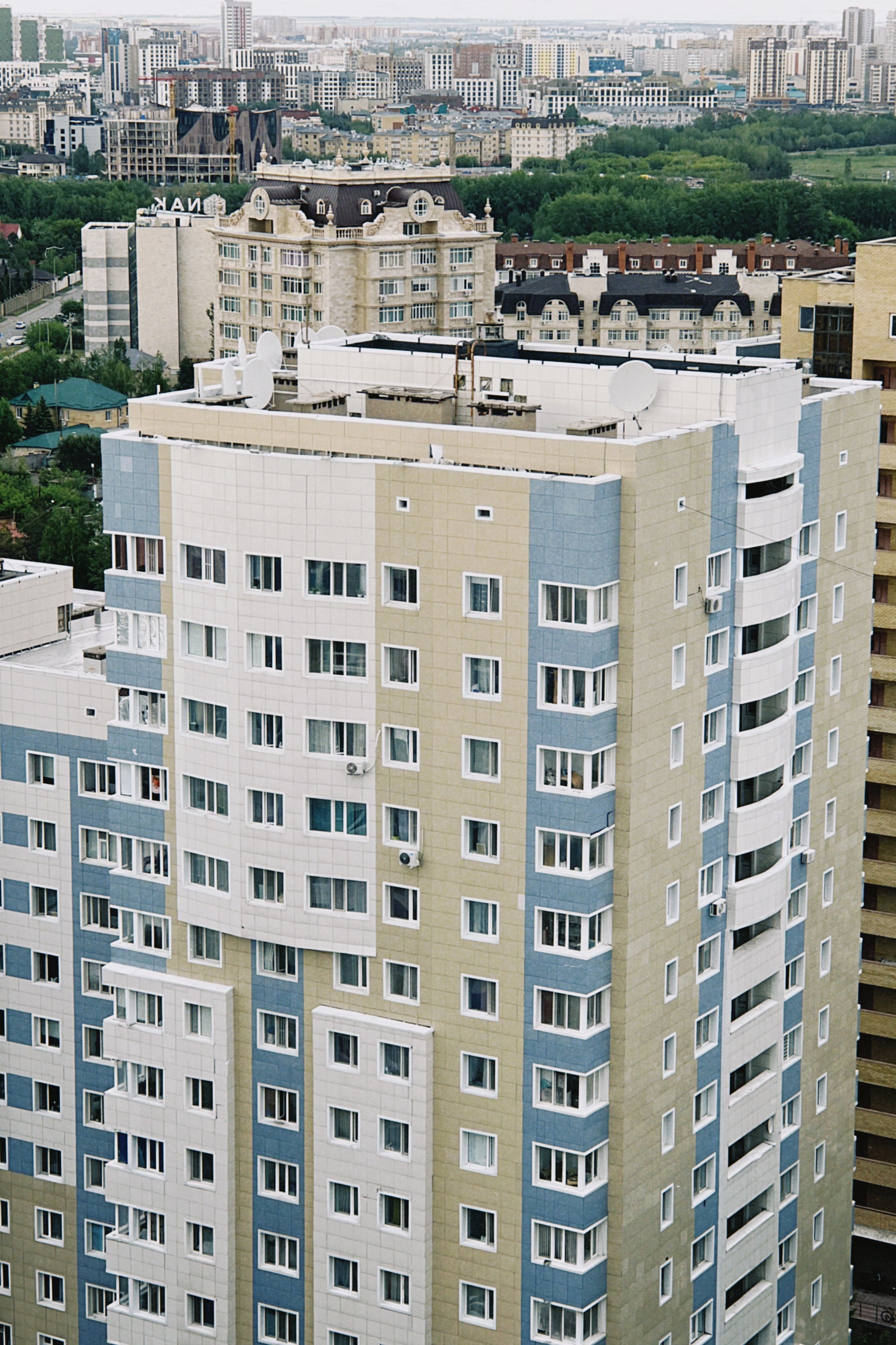 Aerial view of modern high-rise buildings in Astana, Kazakhstan, showcasing urban development and architecture.