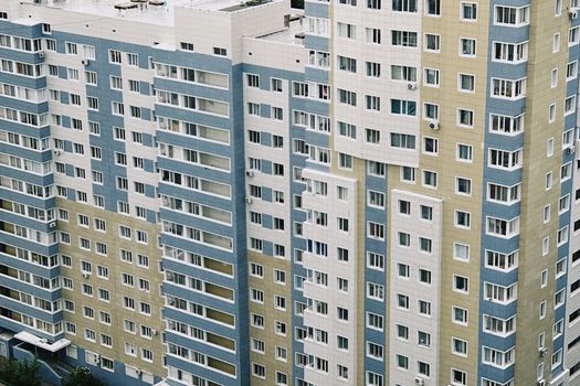 Aerial view of a contemporary high-rise apartment building in Astana, Kazakhstan.