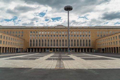 Free Explore the historic architecture of Berlin's Tempelhof Airport, a symbol of 20th-century design. Stock Photo