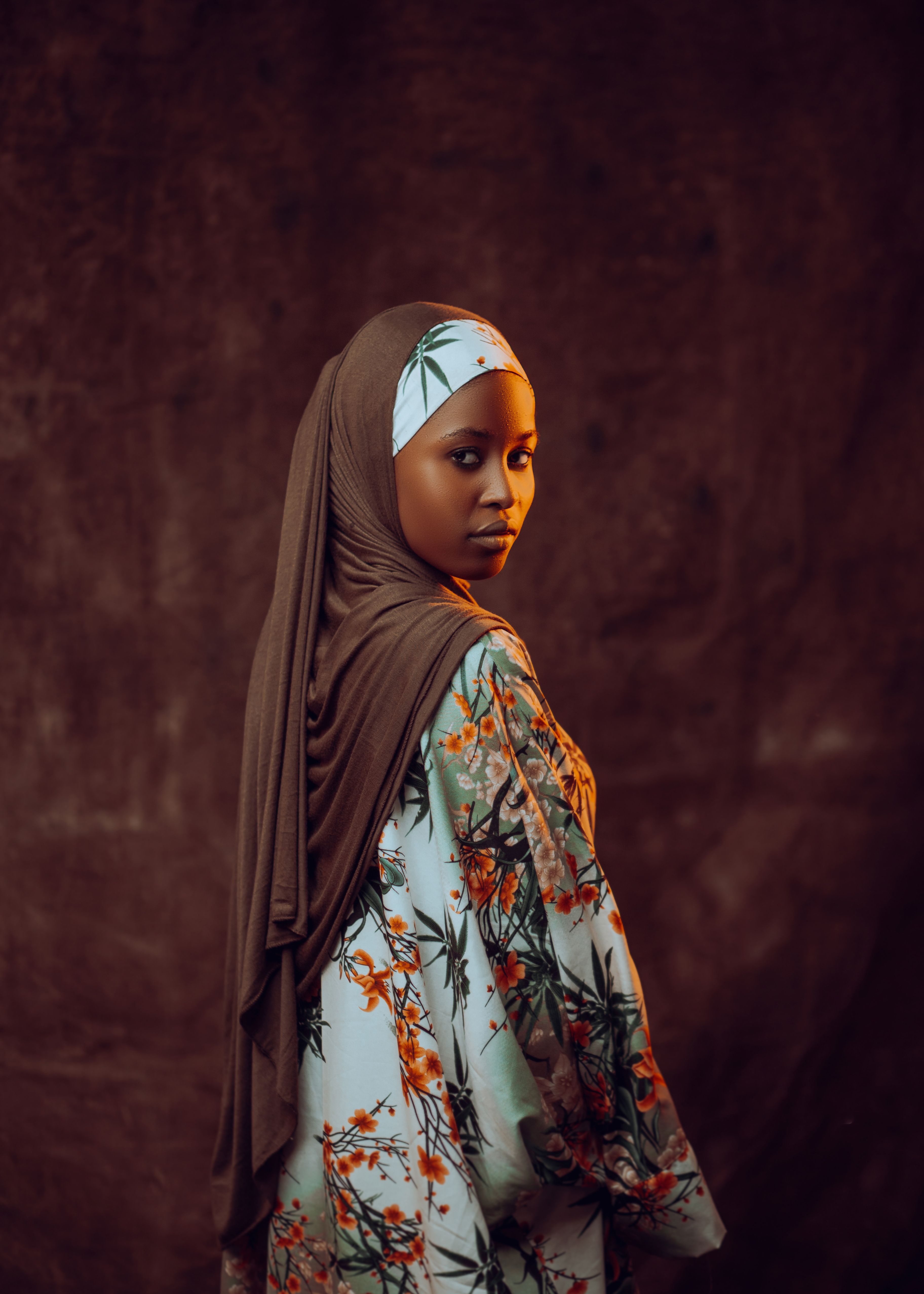 Elegant Portrait of a Woman in Floral Hijab · Free Stock Photo