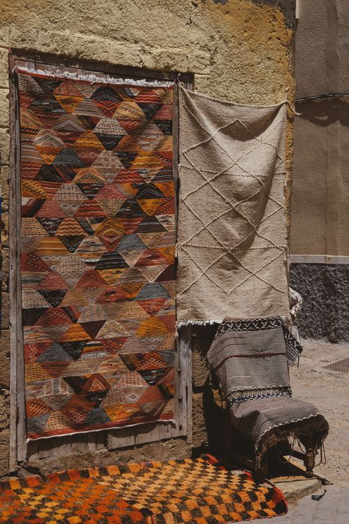Free Colorful Moroccan rugs and carpets on display in El Jadida, offering a glimpse into traditional craftsmanship. Stock Photo