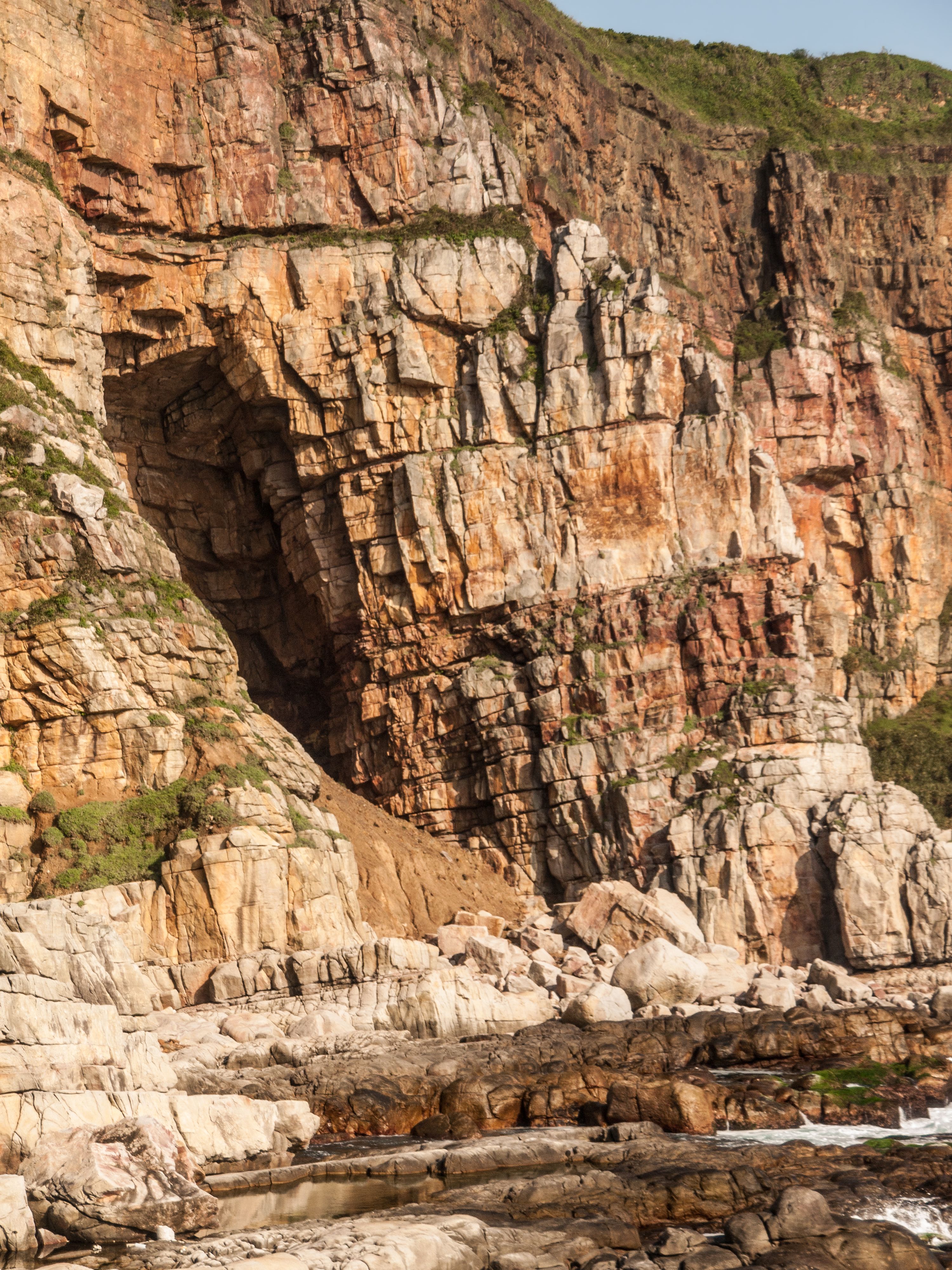 Rugged Coastal Cliffs with Erosion Detail · Free Stock Photo