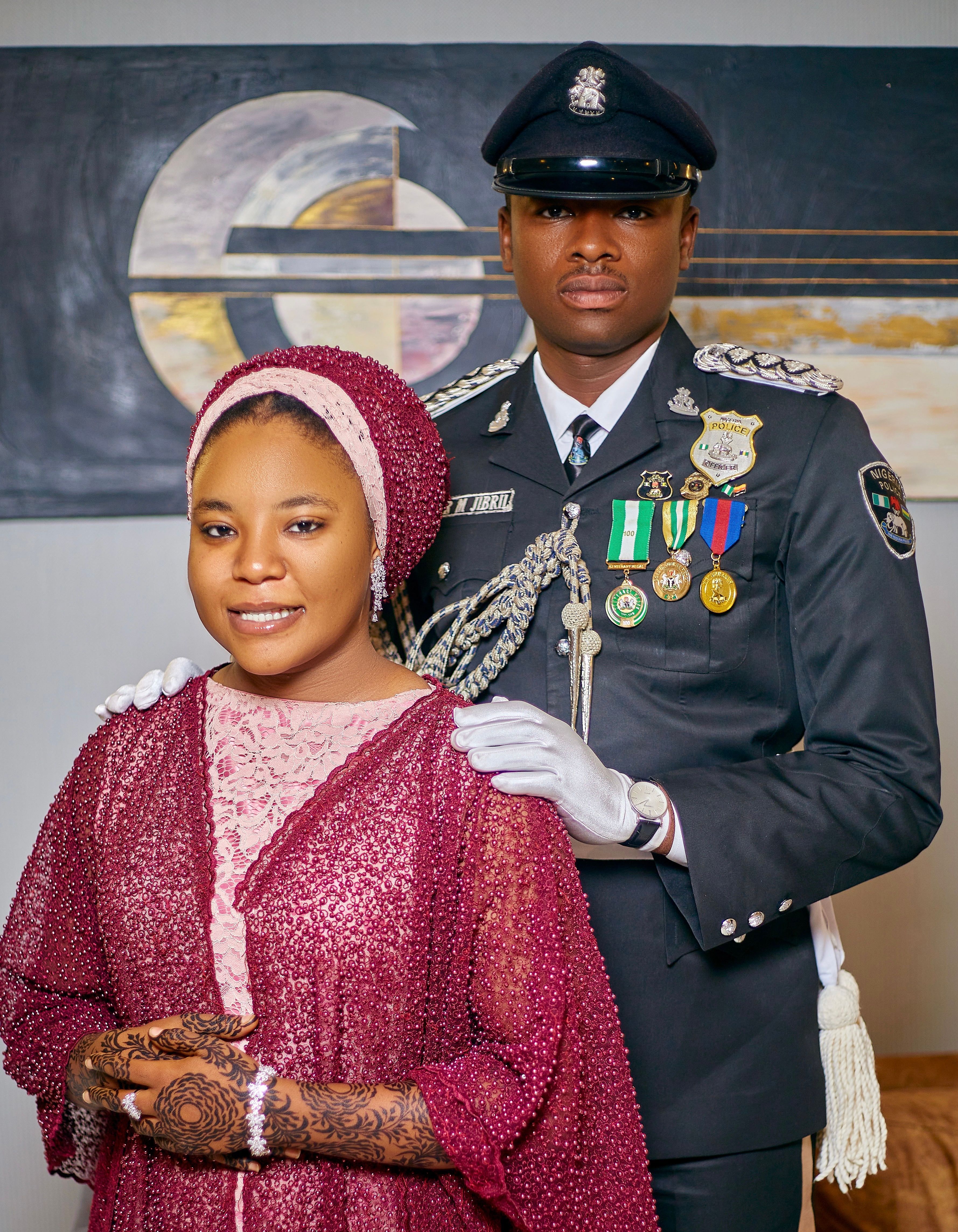 Elegant Portrait of Woman and Officer in Formal Attire · Free Stock Photo