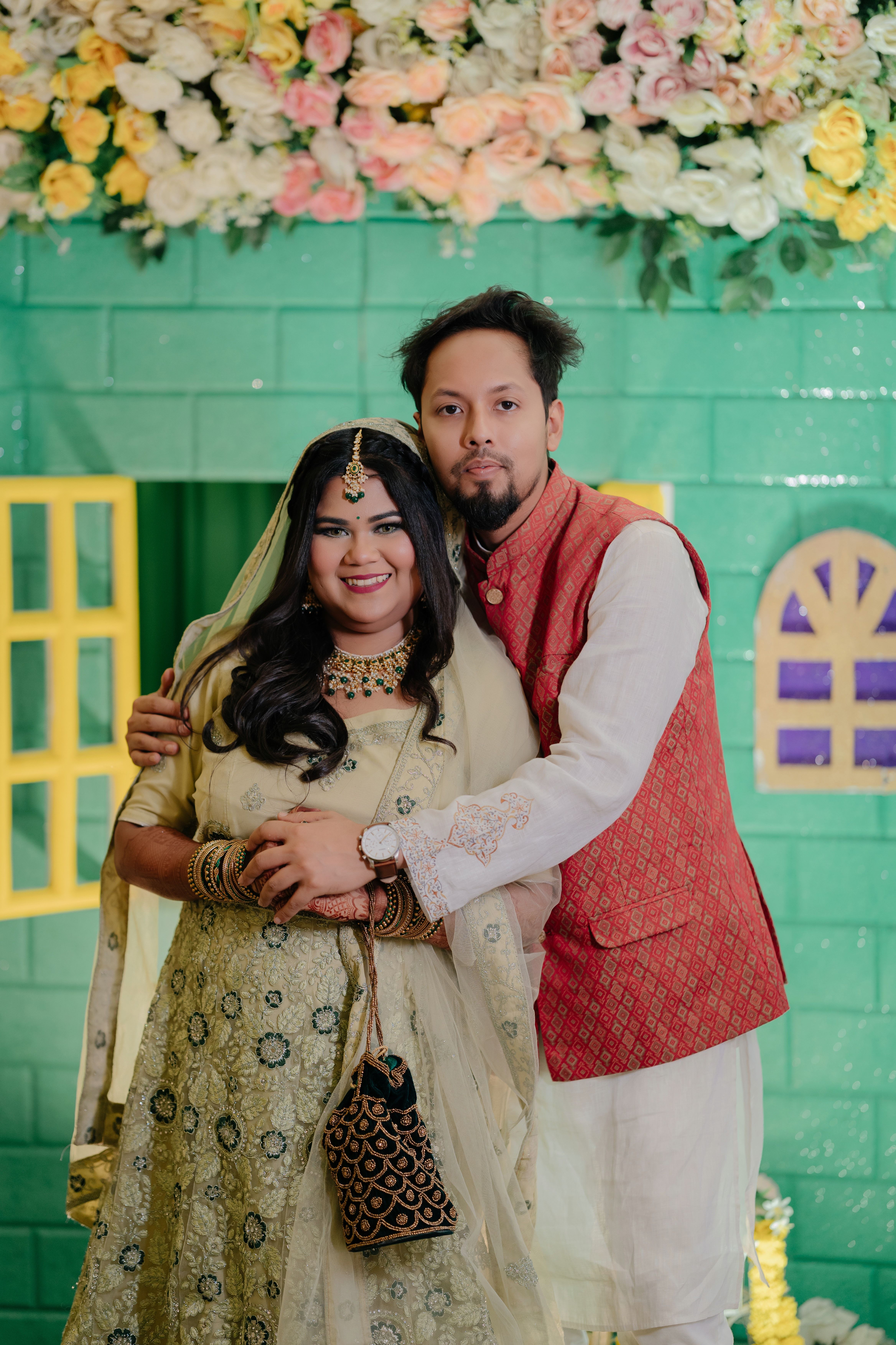 Elegant South Asian Couple in Traditional Attire · Free Stock Photo