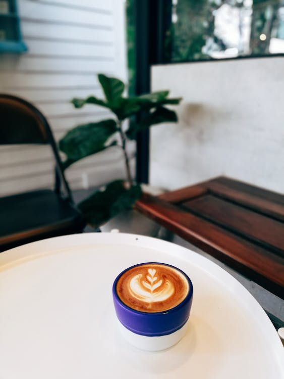 Free Cappuccino on Table Stock Photo