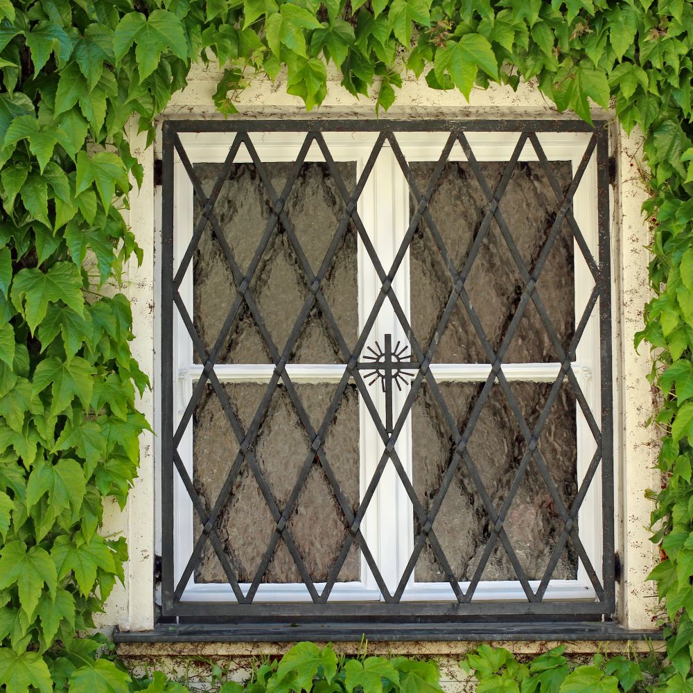 Exterior Painting in Barkingside — careful masking before painting begins