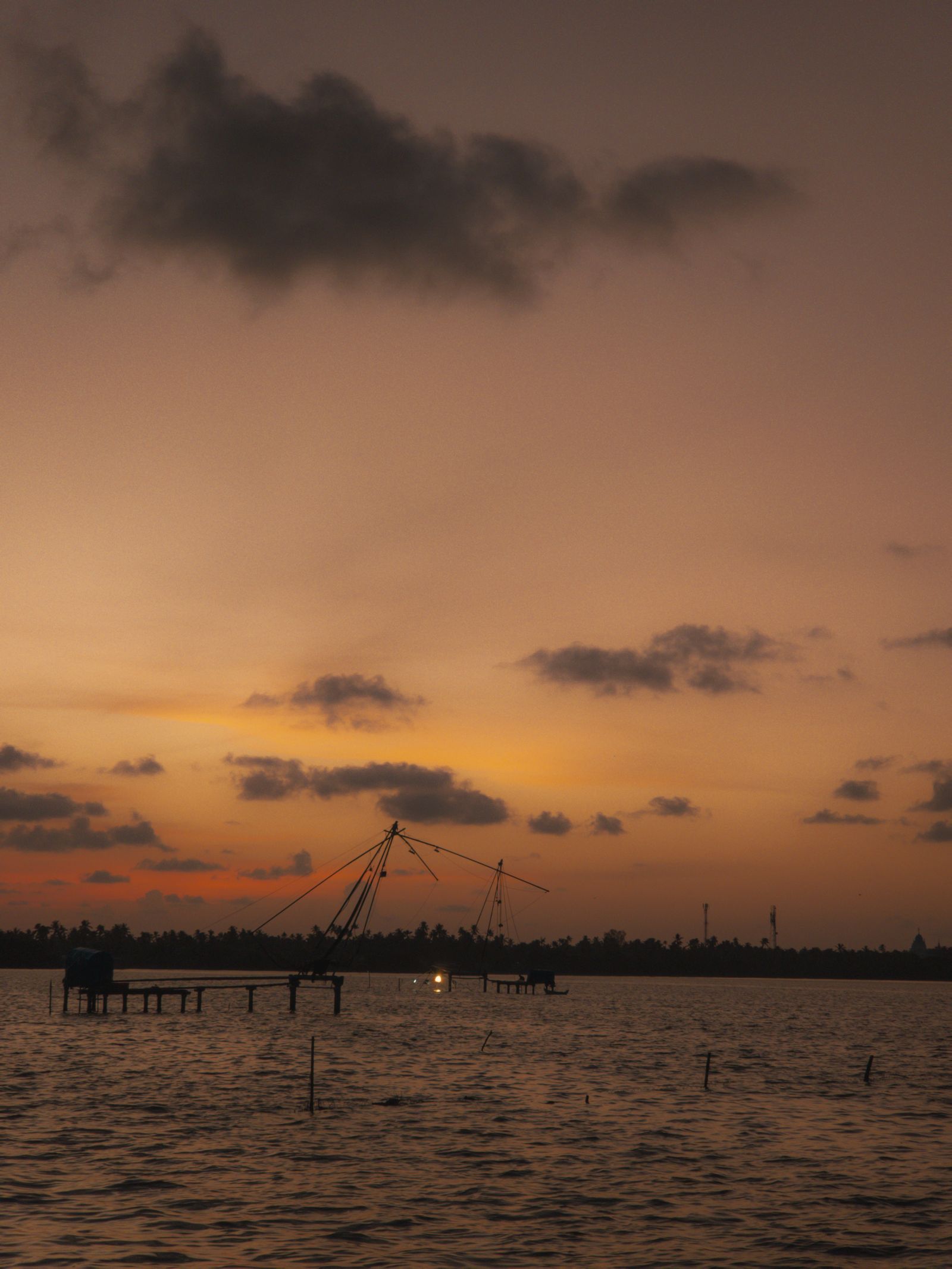Sunset over Chinese fishing nets in Kochi