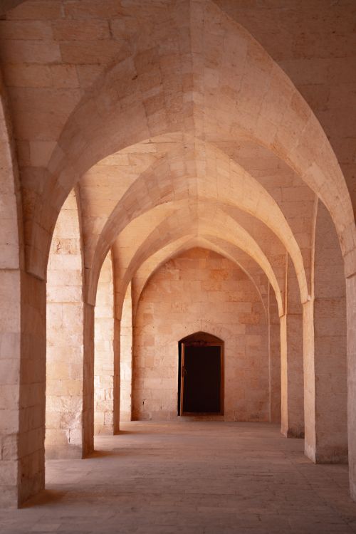 Free Beautiful stone archway showcasing intricate architectural design. Stock Photo