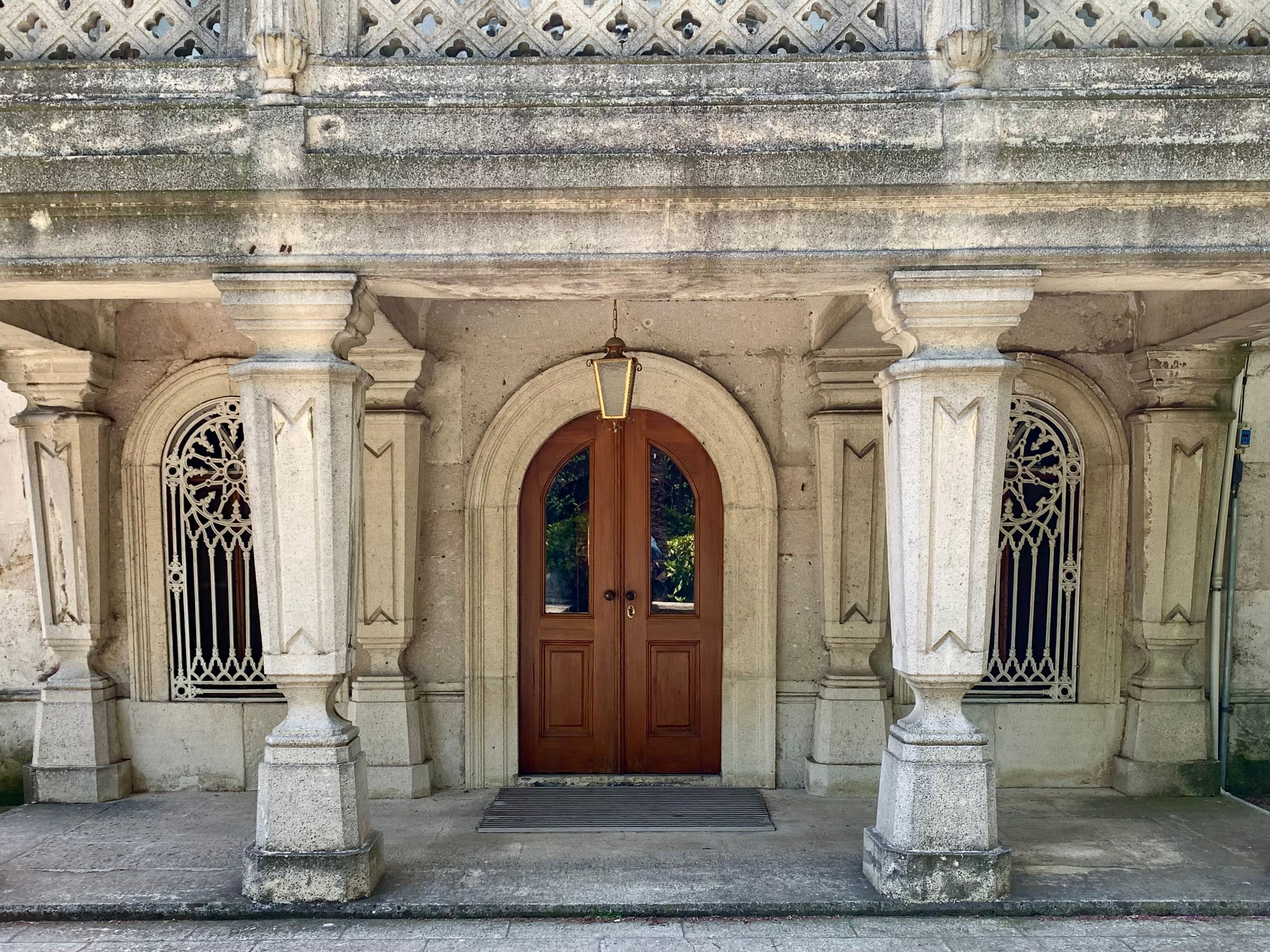 Historic Stone Architecture with Arched Doorway · Free Stock Photo