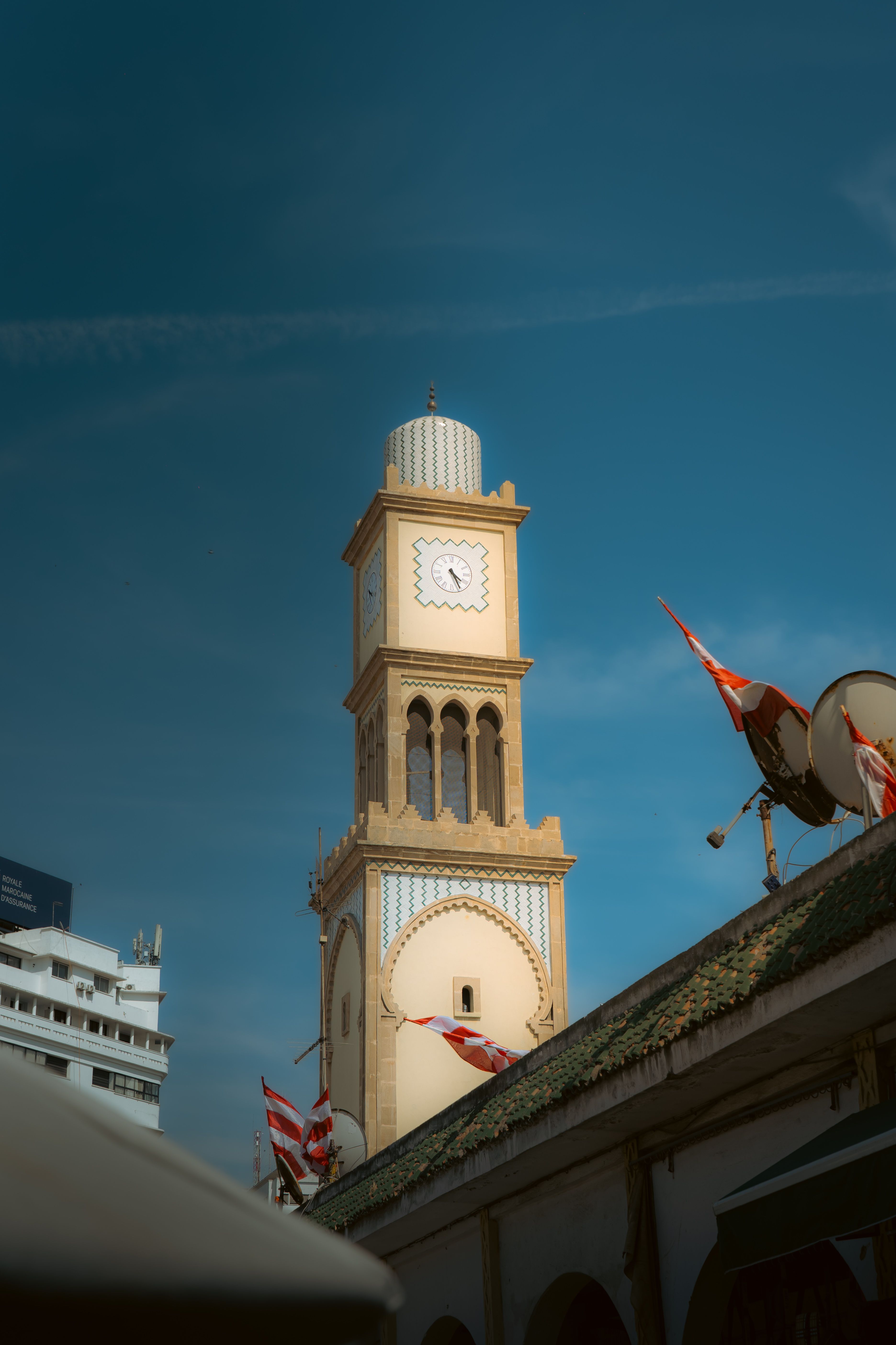 Historic Clock Tower Against Clear Blue Sky · Free Stock Photo