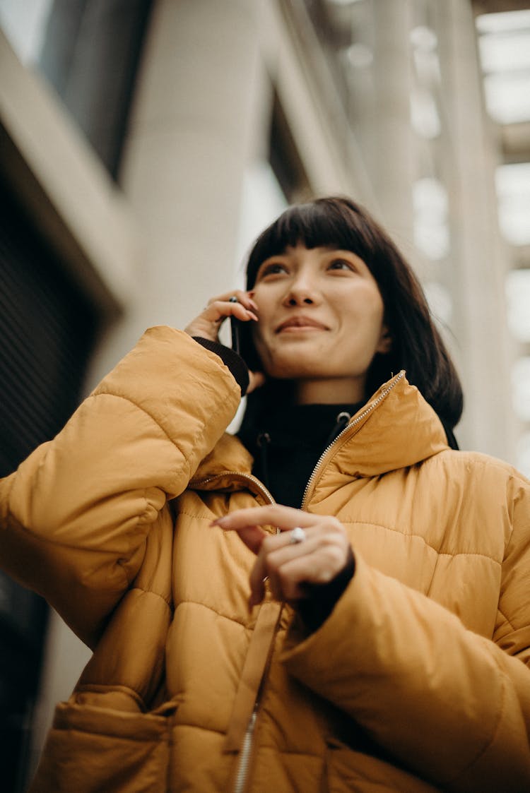 Woman Holding Phone On Her Ear