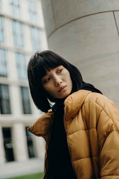 Woman Wearing Yellow Bubble Jacket