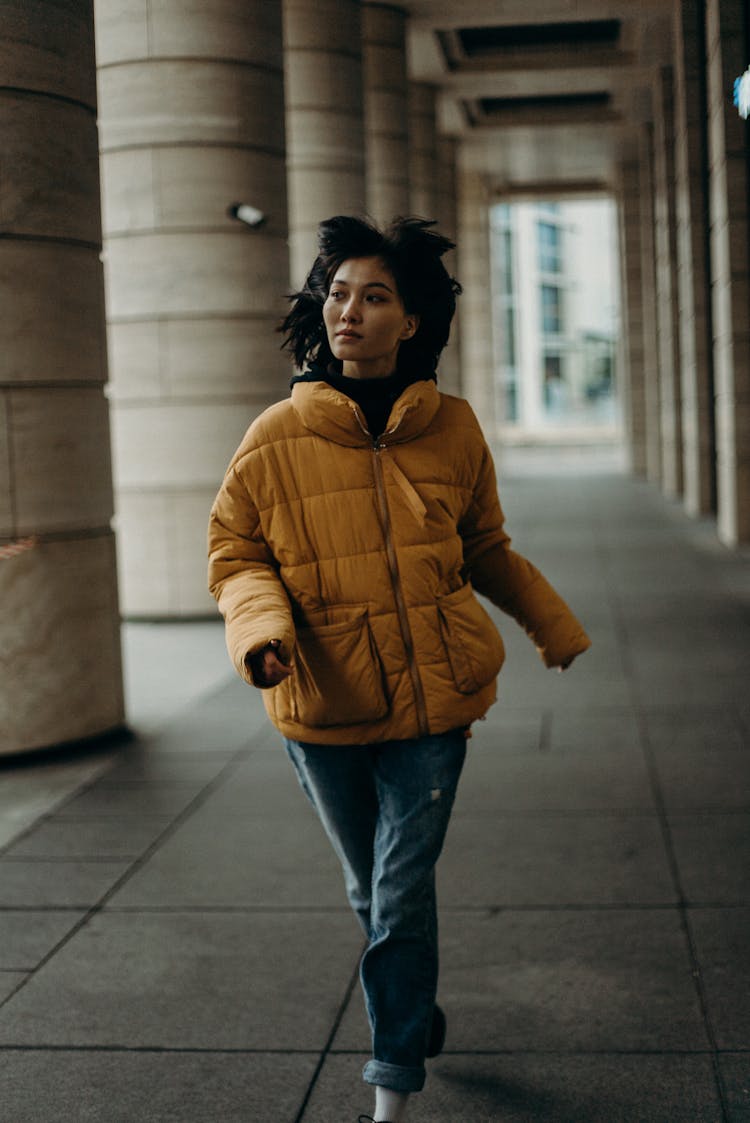 Woman Wearing Yellow Bubble Jacket