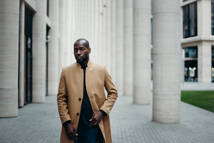 Man Waering Beige Trench Coat