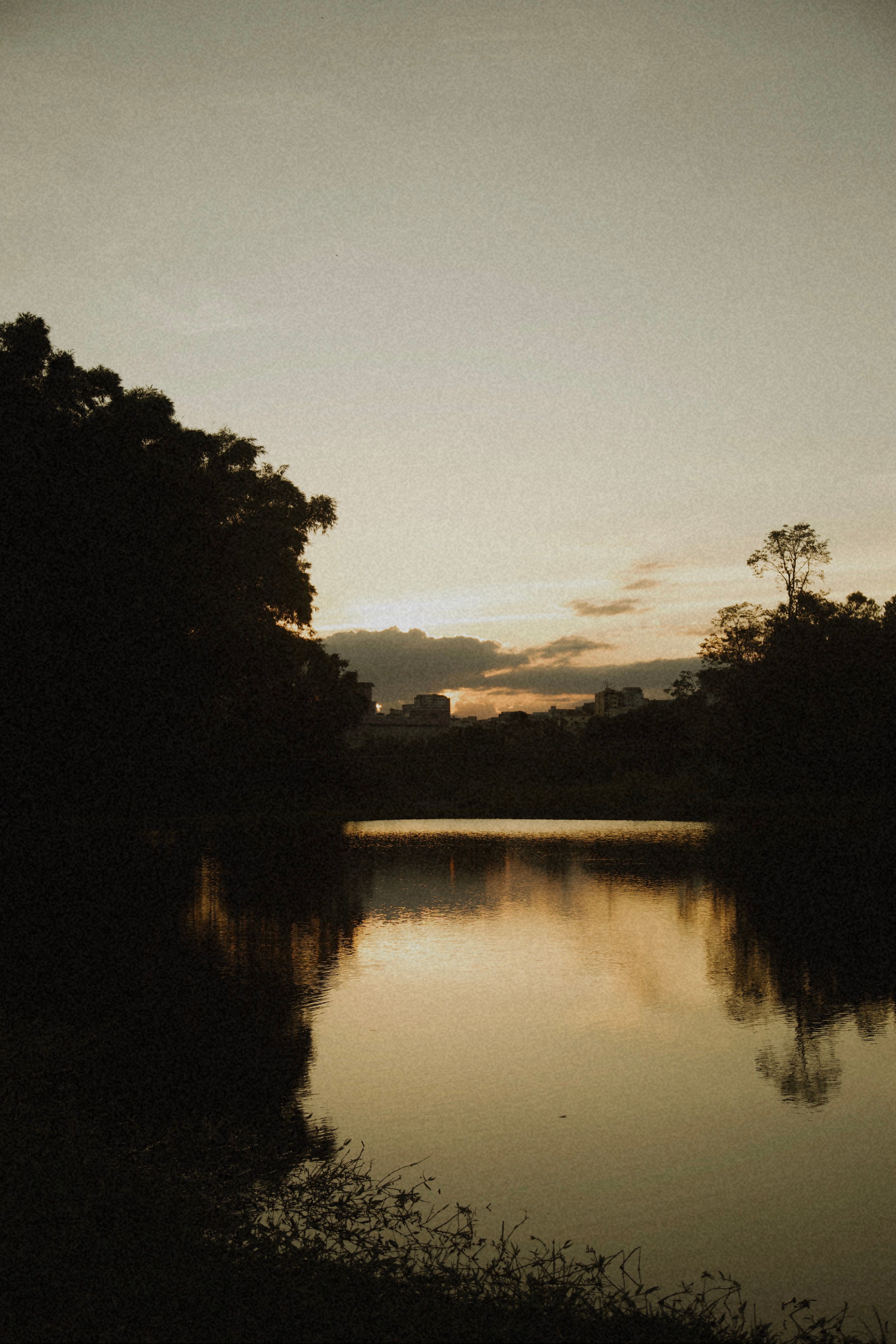 Serene Sunset Over Tranquil Lake Landscape · Free Stock Photo