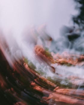 Artistic abstract image showcasing a vivid swirling vortex with bright colors and dynamic motion.