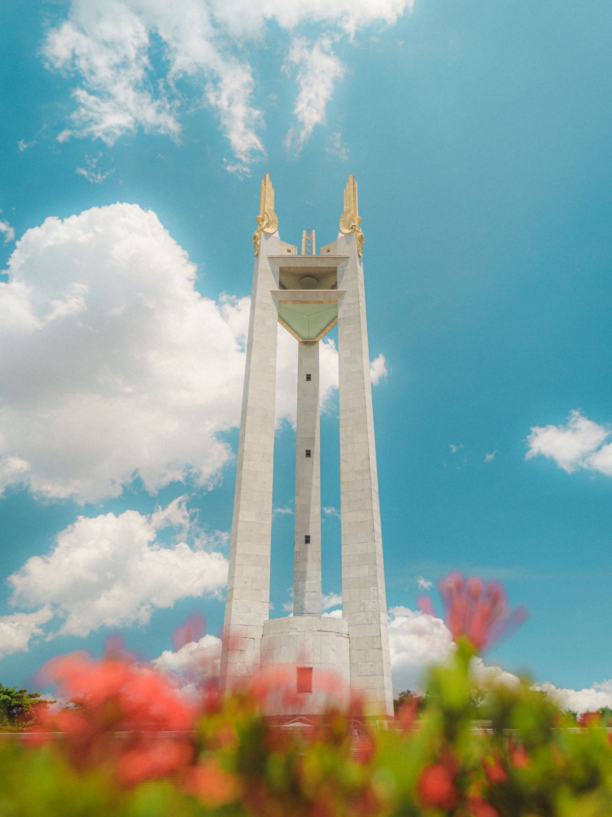 The Quezon Memorial Circle monument under a sunny sky, Quezon City