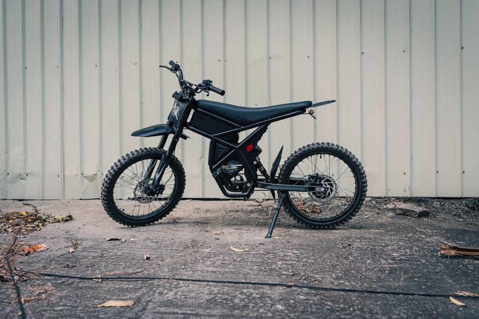 Modern electric motorcycle parked outdoors. Ideal for eco-lifestyle and sport enthusiasts.