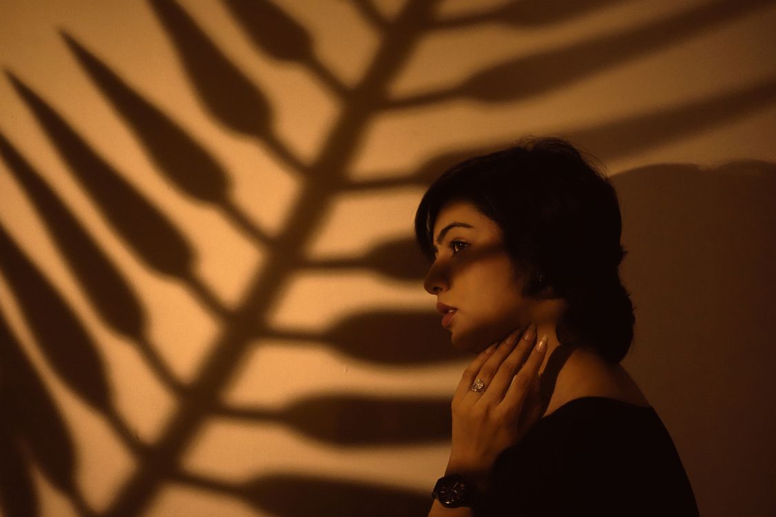 Dramatic Shadows Portrait Dramatic Portrait with Leaf Shadow Play · Free Stock Photo