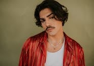 Portrait of a Stylish Young Man with Mustache