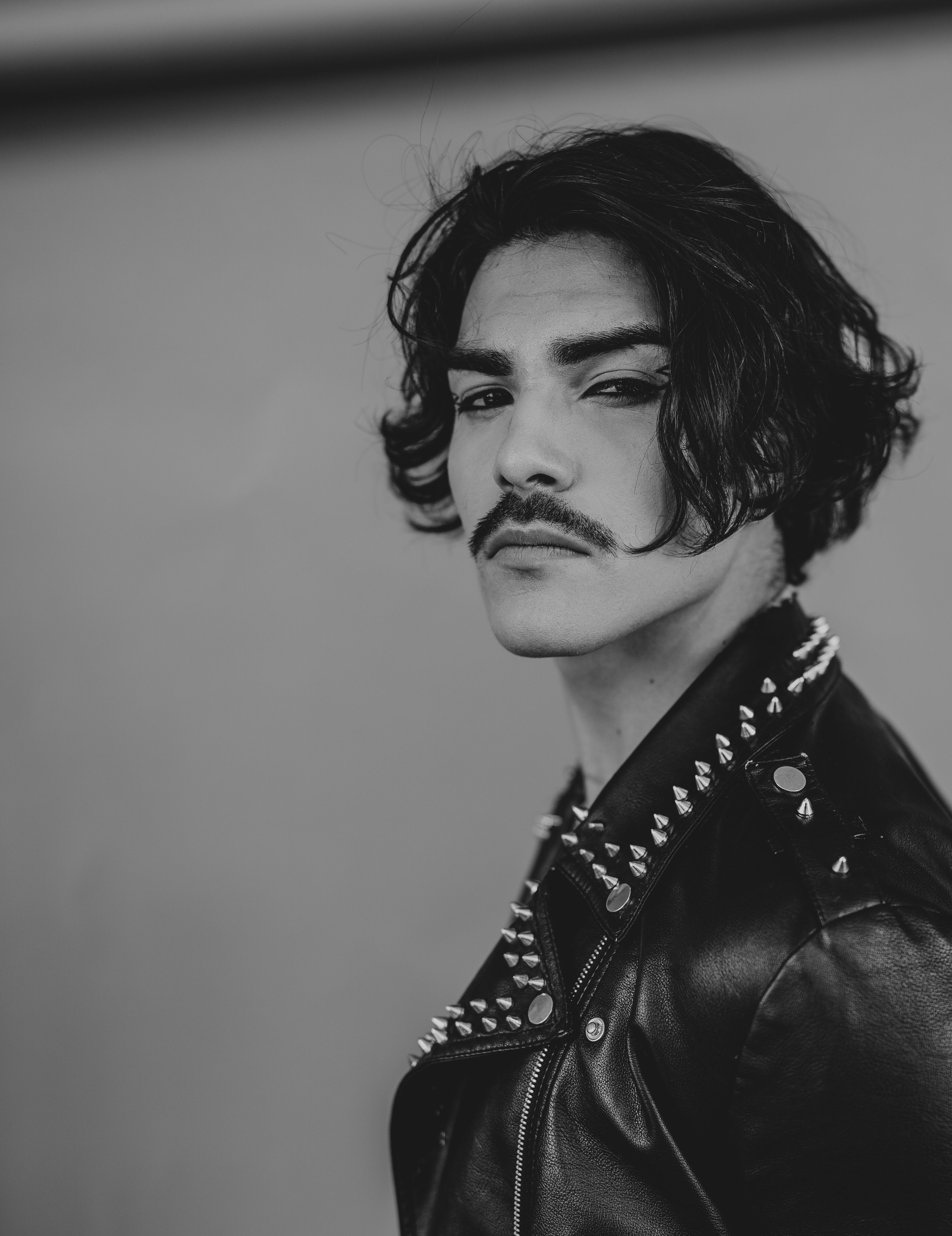 Dramatic Black and White Portrait of a Stylish Man · Free Stock Photo